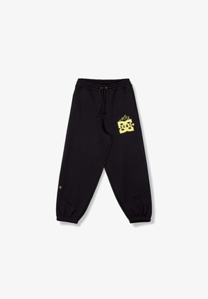 Zwarte joggingbroek met een elastische tailleband en boorden, voorzien van een gele vlamgraphic en het "GRMY"-logo op de bovenste linker dij.