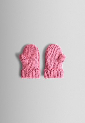 Muffole rosa a maglia con un motivo testurizzato, punte arrotondate e polsini a costine. Design compatto, adatto per essere indossato in tempo freddo.
