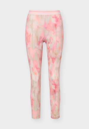 Schmal geschnittene Hose mit Aquarellmuster in Pink und Beige, vorderen Nahtdetails und elastischem Bund.