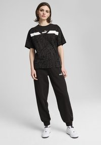 Puma HYPERNATURAL - Treniņtērpa apakšdaļas - black