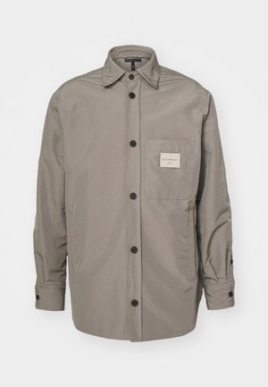 Gray button-up jacket made of smooth fabric; features a chest pocket with a label, long sleeves, and a classic collar design.