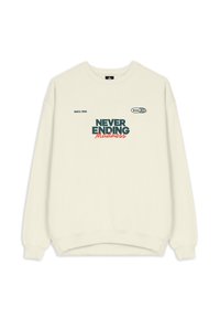 Crème-kleurige sweatshirt gemaakt van zachte stof, met een ronde halslijn. "NEVER ENDING Madness" gedrukt in donkergroen en koraal.