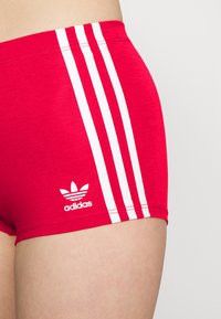 adidas Originals Calças - vivid red