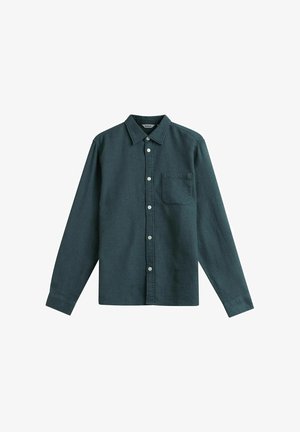 Dunkelgrünes langärmeliges Hemd mit Knopfleiste, Kragen und Brusttasche, versehen mit weißen Knöpfen vorne.
