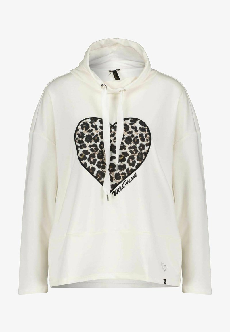 Hoodie bianco oversize con design a forma di cuore in stampa leopardata. Presenta un cappuccio con coulisse e la scritta "WildHeart" sotto il cuore. Tessuto morbido.