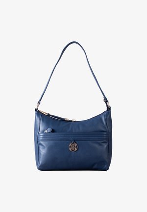 Blue leather shoulder bag with a curved top and single strap. Features a front pocket, subtle stitching, and a round logo accent.