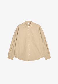 Sélectionné, beige