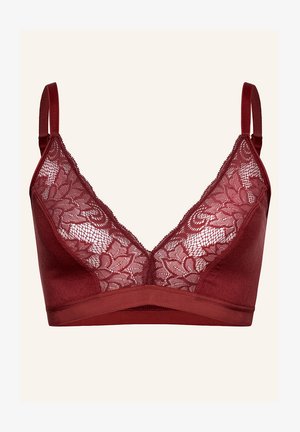 Bralette bordeaux avec des panneaux en dentelle, des bretelles ajustables et un bandeau lisse. Le design combine des motifs floraux avec une texture douce.