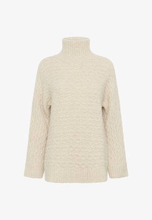 Suéter color crema con cuello alto y patrón de olas texturizadas. Presenta mangas largas y un dobladillo acanalado, hecho de un material suave.
