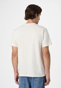 Fila APPAREL VALSERA REGULAR LOGO - Printtipaita - egret