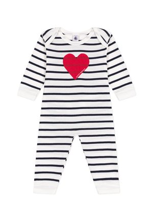 Pruhovaný overal v bílé a námořnicky modré barvě s červeným srdcem na přední straně. Vyrobený z měkké bavlny s dlouhými rukávy a manžetami.