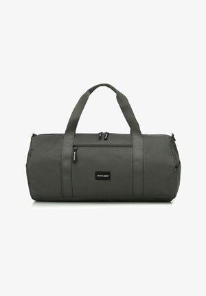 Szary torba sportowa wykonana z trwałego materiału, z dwoma górnymi uchwytami, kieszenią zapinaną na zamek oraz naszywką z logo z przodu.