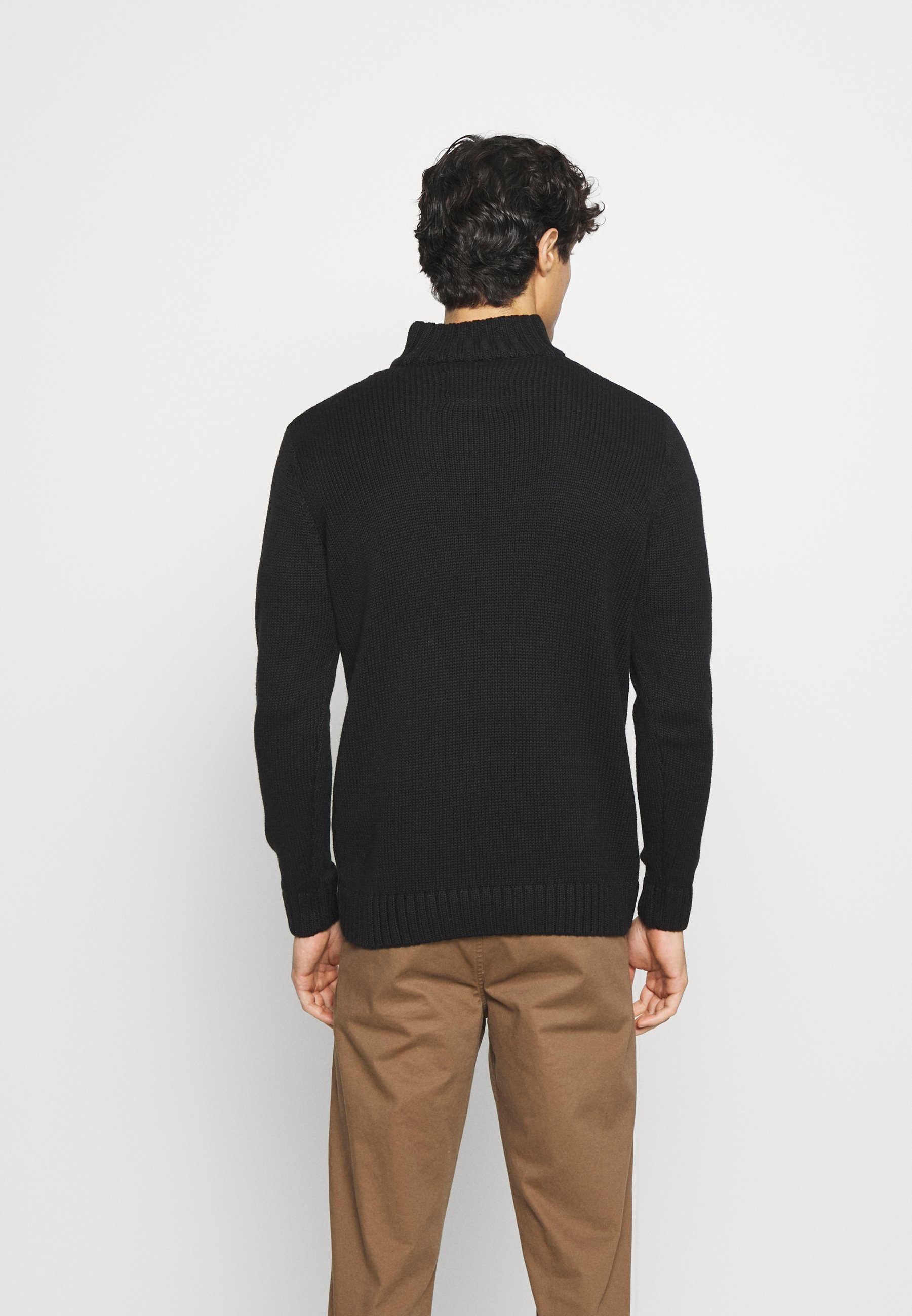 black jumper black jeans