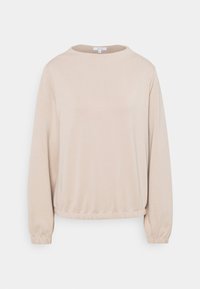 Beżowy sweter z okrągłym dekoltem, długimi elastycznymi rękawami i marszczonym dołem. Wykonany z miękkiego materiału o gładkiej fakturze.