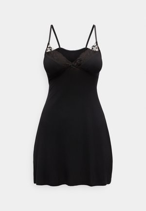 Nuisette noire sans manches avec bordure en dentelle et fines bretelles ajustables, ornée d'un petit nœud au centre de l'encolure.
