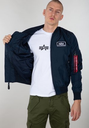 GLOW IN THE DARK - Bomberjacke - rep.blue