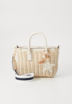 Woven straw handbag in light beige with white accents, featuring a starfish charm, gold hardware, and a striped detachable strap.