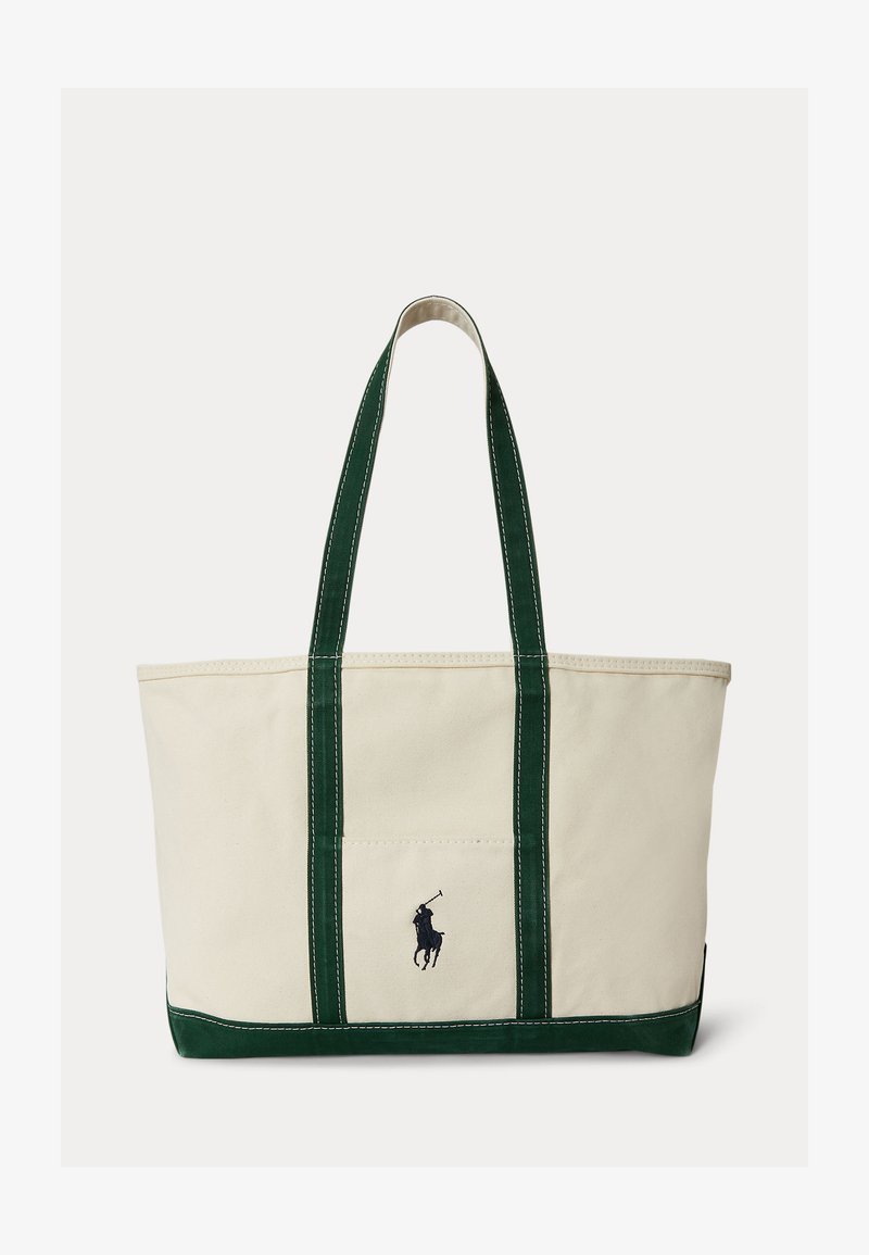Crèmekleurige canvas tas met donkergroene bandjes en onderrand, met een klein geborduurd polospelerlogo op het voorvak.