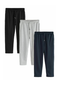 Tres pares de pantalones de chándal: negros, grises y azul marino. Cuentan con cinturas elásticas, bolsillos laterales y una tela suave y texturizada.