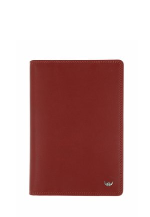 Brown leather notebook cover with visible stitching and a small silver horned logo at the bottom right corner, isolated on white background.