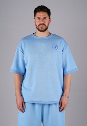 DCA EAGLE - Print T-shirt - sky blue