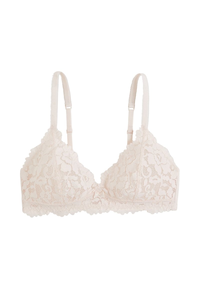 Brassière en dentelle d'un doux rose pâle avec des motifs floraux, des bretelles réglables et des bords festonnés pour un design délicat.