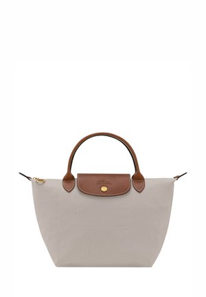 Grey nylon tote bag with a brown leather flap and handle, gold hardware, and a spacious, structured design. Reinforced stitching accents.