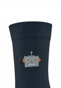 Calzino nero lavorato a maglia con design di un robot in grigio, arancione e bianco, con un motivo a coste testurizzato e un volto ricamato giocoso.