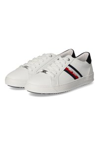White leather sneakers with black accents, featuring a lace-up design, textured sole, and red and navy stripes on the side.