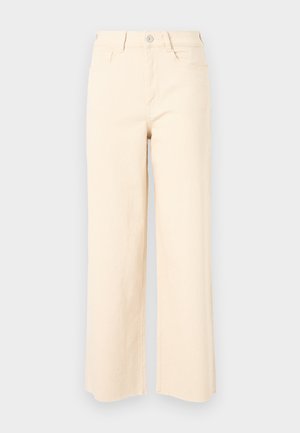 Beige weit geschnittene Jeans aus Baumwolle mit hoher Taille, Knopfverschluss und zwei Fronttaschen mit einer glatten, strukturierten Oberfläche.