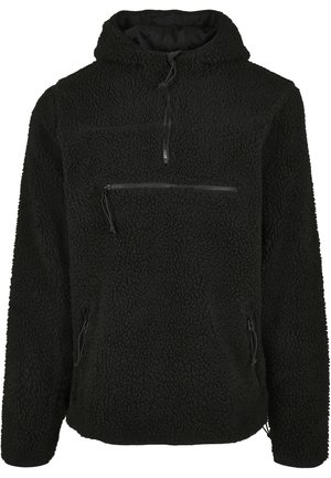 Zwarte fleece sweater met capuchon, voorzien van een kwart-rits aan de voorkant, een gestructureerd oppervlak en drie ritszakken aan de voorkant en zijkanten.