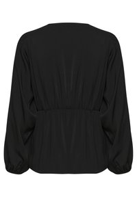 Blusa negra de corte relajado con mangas largas y en forma de globo, y cintura fruncida. Textura suave con escote redondo.