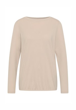 Chemise beige à manches longues avec col rond et ourlet froncé, présentée sur un fond blanc.