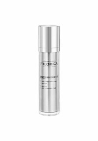 Clear glass bottle with a silver pump cap. Label includes “Laboratoires FILORGA” and product details in black text on the front.