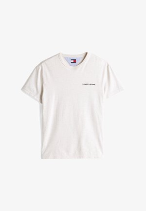 Kremfarget bomull t-skjorte med v-hals, korte ermer og en svart "TOMMY JEANS" logo trykt på venstre side.