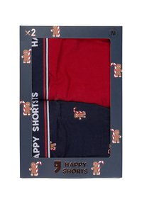 Twee paar herenshorts in rood en marineblauw, met een patroon van pepernotenmannen, elastische tailleband met de tekst "HAPPY SHORTS", verpakt in een decoratieve doos.