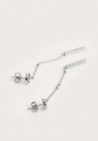 Silver drop earrings with rectangular crystal-studded bars connected by thin linked rods and butterfly back fasteners on a white background.