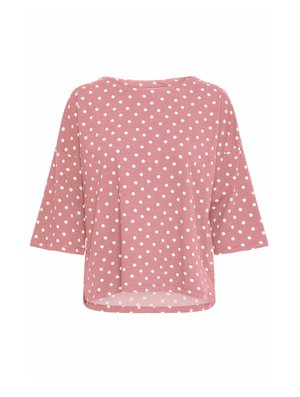 Světle růžový top s krátkým rukávem a bílými puntíky, zaoblený výstřih, volný střih, křivka na spodním lemu a jemná textilie.