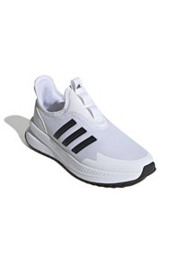 Zapatilla deportiva blanca con parte superior de malla, diseño de tres rayas negras, estilo sin cordones, suela de goma y cuello acolchado para mayor comodidad.