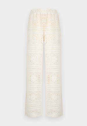Λευκό παντελόνι με φαρδιά μπατζάκια από δαντέλα με γεωμετρικά και ανθικά μοτίβα με κοψίματα, ελαστική μέση και ημιδιαφανές ύφασμα.
