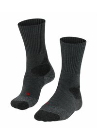 Chaussettes noires côtelées avec talon et pointe renforcés, accents gris et logo. Hauteur moyenne pour le confort et la durabilité.