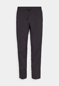 Sorte, letvægts joggerbukser med elastisk talje og justerbar snøre. Har en tapered form og lynlåse ved anklerne.