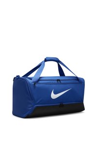 Blauwe sporttas met een zwarte onderkant, voorzien van een wit Nike-logo, dubbele ritssluiting en gewatteerde handvatten voor eenvoudig dragen.
