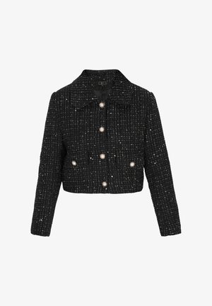 Giacca nera cropped realizzata in tessuto testurizzato, con motivo a griglia, grandi bottoni perla e colletto classico. Progettata con due tasche frontali.