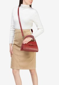 Miriade Borsa a mano - rosso