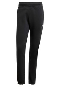 Svarta mjukisbyxor av mjukt tyg med elastisk midja, avsmalnande ben och en liten vit logotyp på vänster lår.