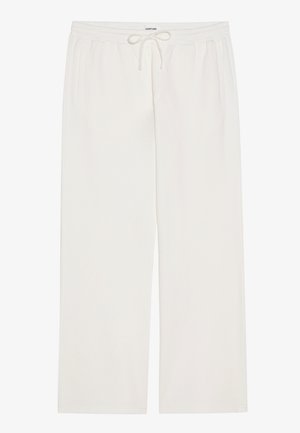 Pantalon de jogging blanc à jambes larges avec taille élastique et cordon de serrage. Il dispose de deux poches latérales et d'un tissu doux et texturé.
