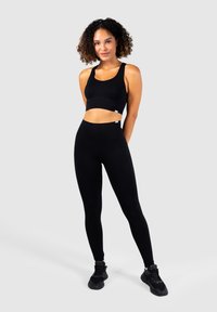 Smilodox SEAMLESS - Tights - schwarz