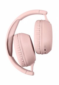 Draadloze koptelefoon in zacht roze, met gevoerde oorkussens en een flexibele hoofdband. Voorzien van een oplaadpoort aan één kant.