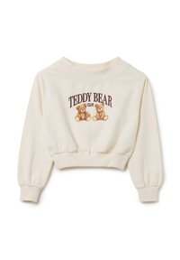 Felpa corta color crema con scollo rotondo, caratterizzata da una stampa di due orsetti di peluche e la scritta "TEDDY BEAR CLUB" in bordeaux.